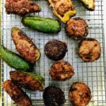 Jalapeno peppers and shiitake mushrooms stuffed with potsticker filling and fried