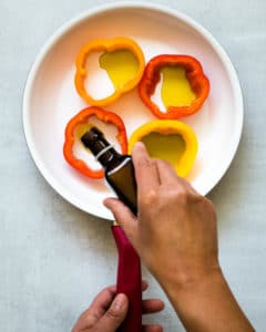 pour oil into each pepper ring