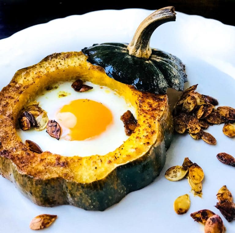 Baked acorn squash eggs in a hole • We Count Carbs