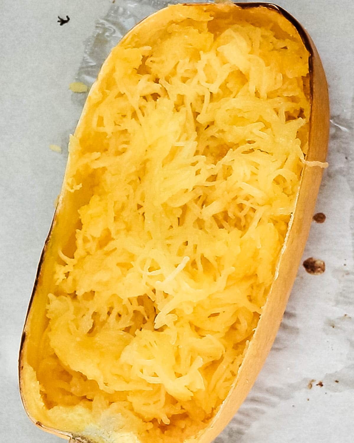 Cooked spaghetti squash served in the rind.