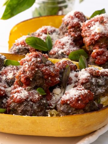These easy keto meatballs are baked in the oven and ready in under 30 minutes for a savory appetizer, main course, side dish or snack.