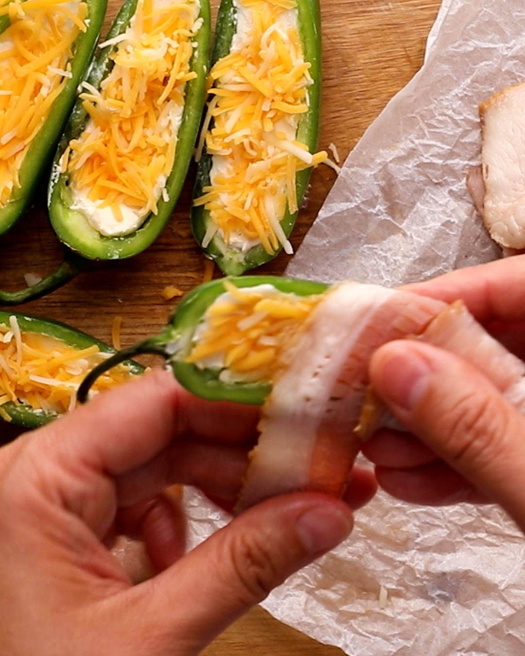 Air Fryer Bacon Jalapeno Poppers Step 3 wrap with bacon