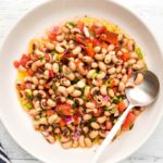 Black-eyed pea salad in a bowl overhead view