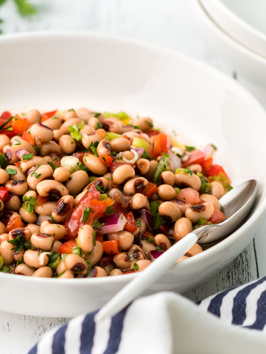 Black-eyed peas salad served in a bowl with a spoon