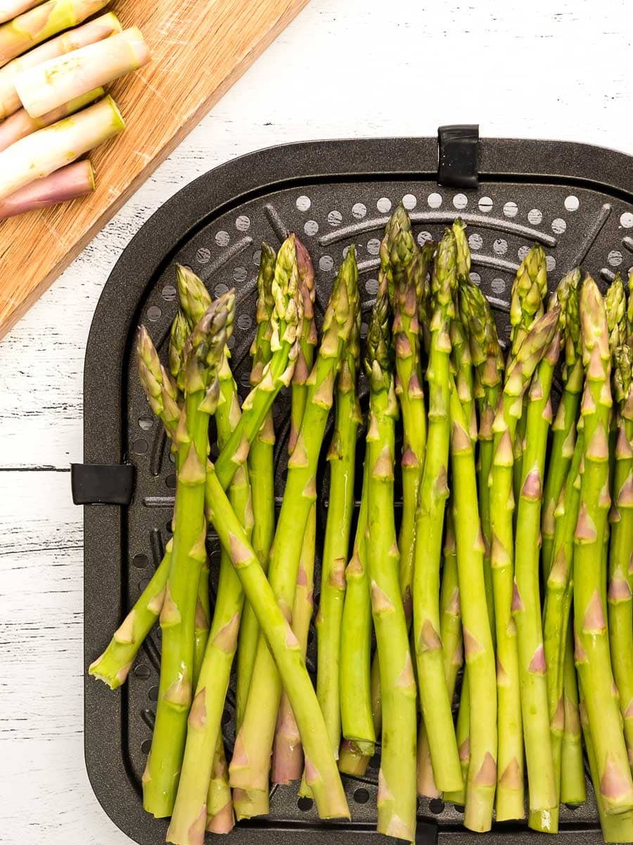 air fryer bacon wrapped asparagus step 1 trim to fit air fryer basket