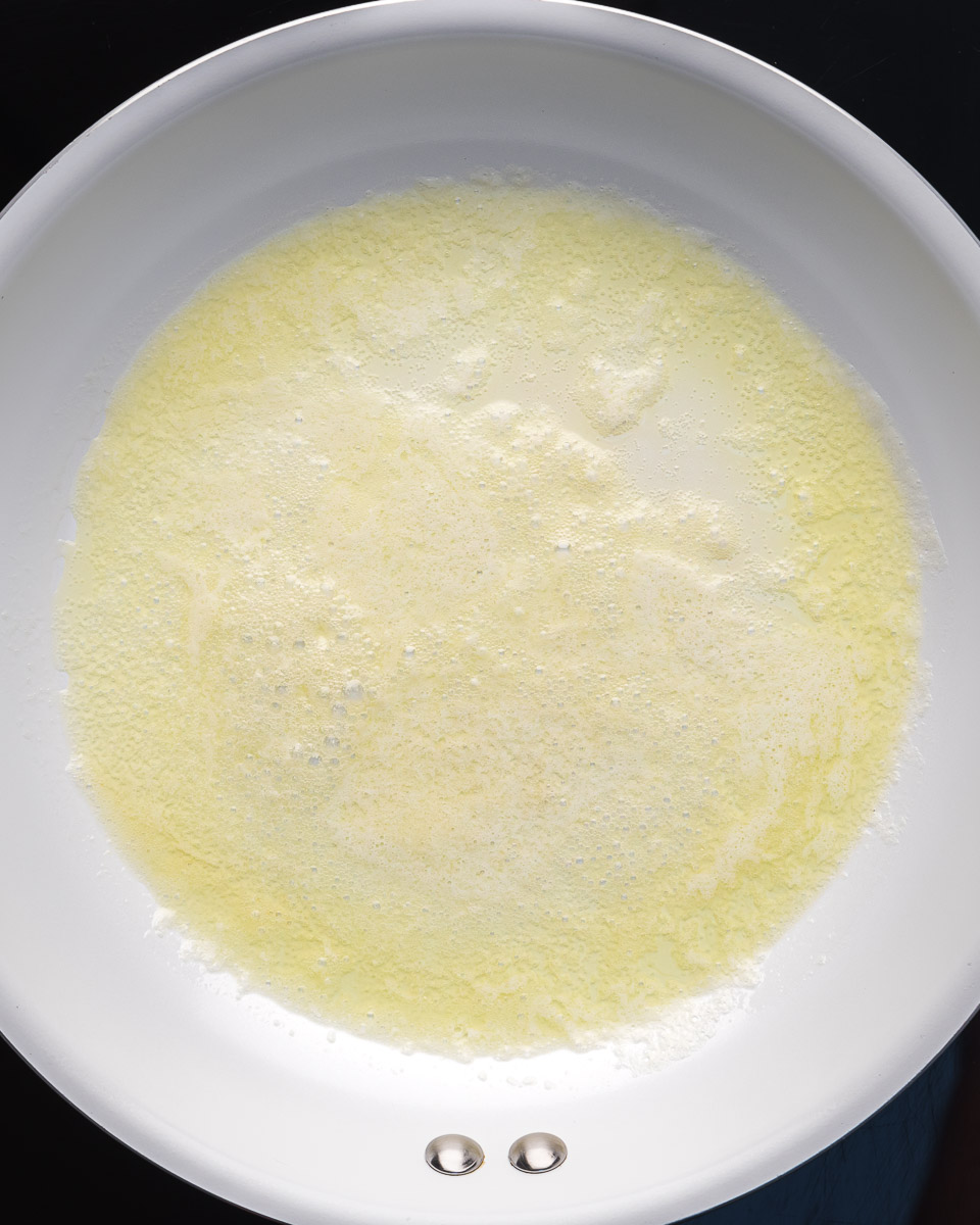 Eggs over medium step 2 melted butter