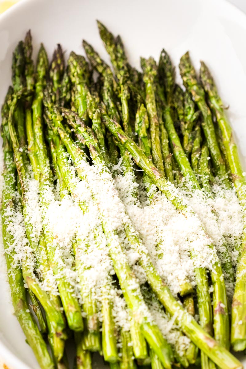 Air fryer asparagus served with Parmesan cheese 45 shot