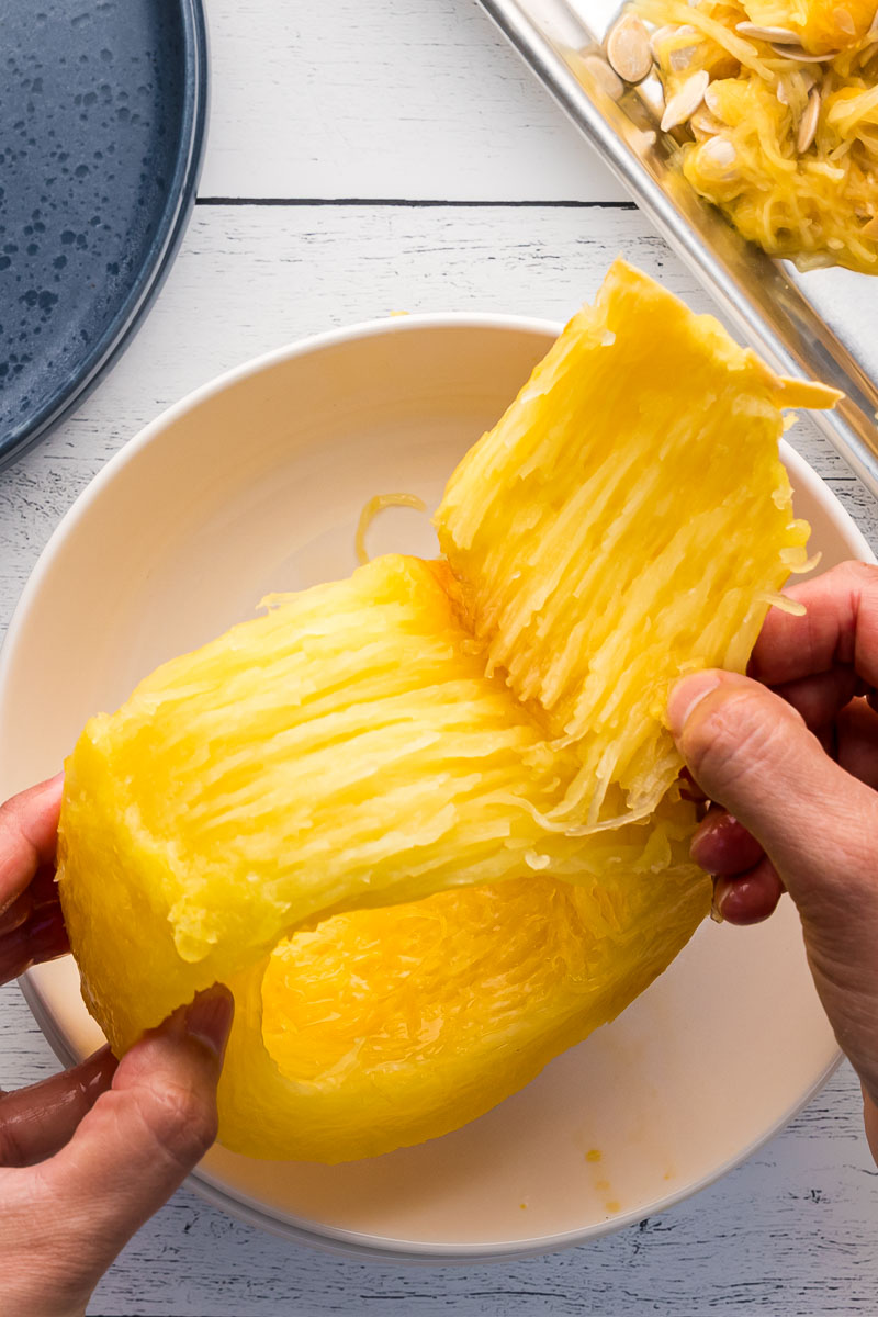 How to cut a spaghetti squash to get long noodles step 1 peel skin