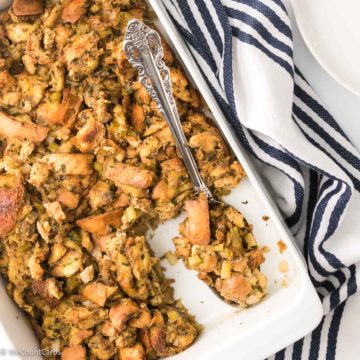 Keto stuffing featured image in pan with a spoonful of stuffing